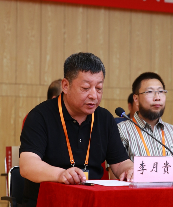 10李月贵宣读贺信.jpg 10李月贵宣读贺信.jpg