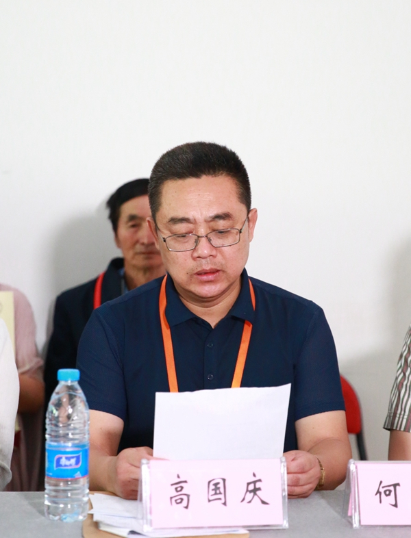 9高国庆宣读文件.jpg 9高国庆宣读文件.jpg